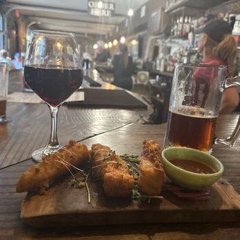 The Last Queen - Tempranillo red, fried halloumi, and old speckled hen. - British Near Me - Enon, Ohio