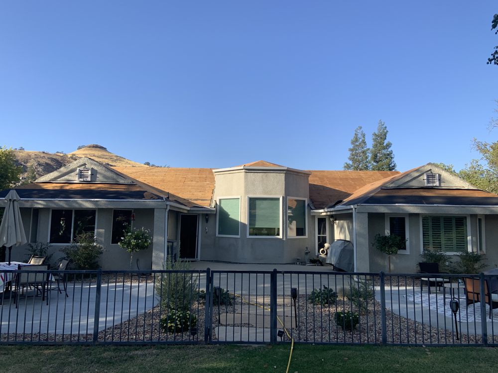 Slide of Revival Roofing