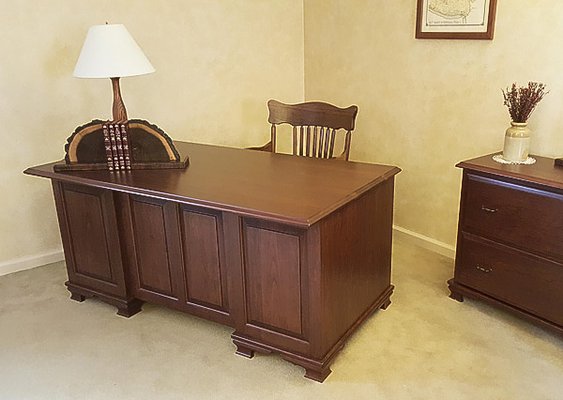 Office Furniture - Each piece of 100% solid hardwood office furniture is hand crafted in our own Lancaster County woodworking shop by one craftsman who follows the custom made piece from picking the wood to the final detail – sign and dated.  Our design team listen intently to your ideas to create the perfect work space that will exceed expectations.

Browse our gallery of custom made office furniture - Executive desks, wall units, work stations, L-shape desks, roll-top desks, computer desks, lamps, student desks, writing desks, desk-in-a-cabinet, conference tables, bookcases,  bookcase wall units, and filing cabinets. 

Still looking for a unique design, contact us and we will bring your ideas to life.