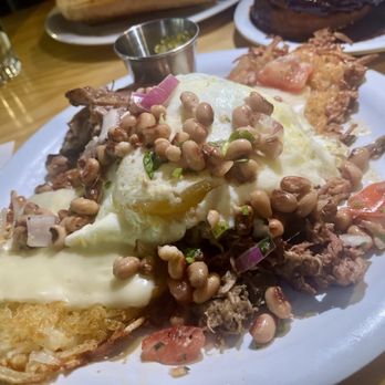 The Junction Kitchen - Mexican Hash  The green sauce inside the silver container....ask for extra!! It sets the dish off!!!! My egg was fried perfectly. - Breakfast & Brunch Near Me - North Charleston, South Carolina