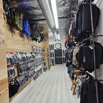 Spear America - Our neoprene corridor is like nothing you have ever seen. Large inventory of women wetsuits. - Dive Shops Near Me - Dana Point, California Spear America - Our neoprene corridor is like nothing you have ever seen. Large inventory of women wetsuits. - Dive Shops Near Me - Dana Point, California