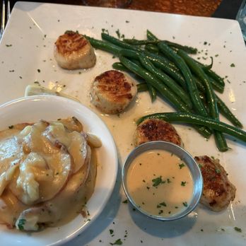 Watermark Grille - Pan seared scallops and potatoes au gratin - Steakhouses Near Me - Naples, Florida Watermark Grille - Pan seared scallops and potatoes au gratin - Steakhouses Near Me - Naples, Florida