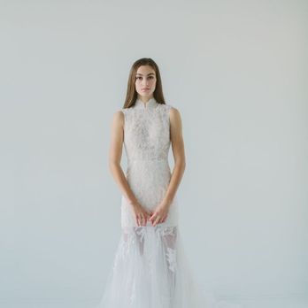 O M Design Studio - Lyss Lace Wedding Gown with Mandarin collar and open back. Available in the studio and for customization. - Bridal Near Me - Vancouver, British Columbia O M Design Studio - Lyss Lace Wedding Gown with Mandarin collar and open back. Available in the studio and for customization. - Bridal Near Me - Vancouver, British Columbia