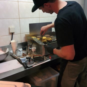 Omnom Burger - Tiny grill. But the man works it well! Good timing by the cook, leaving our meals eaten and us wanting more... - Burgers Near Me - Vienna, 9