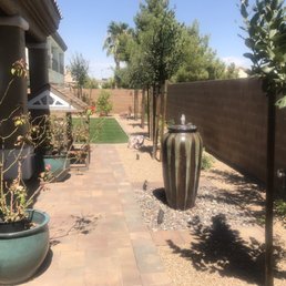 Besides the two teal pots and covered patio visible in this photo, everything else is new installation.
