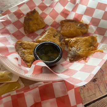 Chris Madrid's - Half order of bean and cheese nachos (some may have already been eaten) - Burgers Near Me - San Antonio, Texas Chris Madrid's - Half order of bean and cheese nachos (some may have already been eaten) - Burgers Near Me - San Antonio, Texas