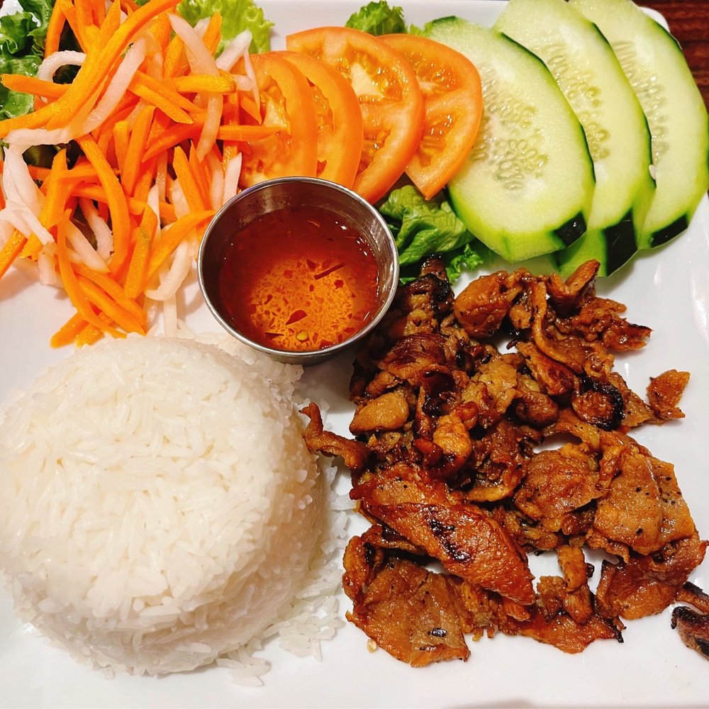 Simply Pho House - Grilled pork rice $10.75, pour fish sauce over rice with a teaspoon of soy sauce. Enjoy! - Asian Fusion Near Me - Marble Falls, Texas Simply Pho House - Grilled pork rice $10.75, pour fish sauce over rice with a teaspoon of soy sauce. Enjoy! - Asian Fusion Near Me - Marble Falls, Texas