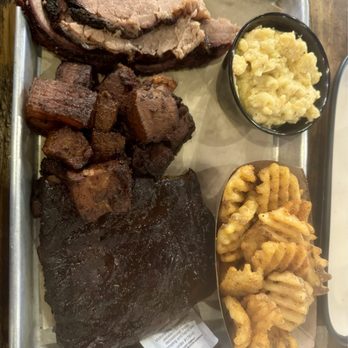 Sauced BBQ & Spirits - 3 meat combo with ribs, brisket, pork belly bites. Waffle fries with BBQ rub and mac and cheese side - Barbeque Near Me - Irvine, California Sauced BBQ & Spirits - 3 meat combo with ribs, brisket, pork belly bites. Waffle fries with BBQ rub and mac and cheese side - Barbeque Near Me - Irvine, California