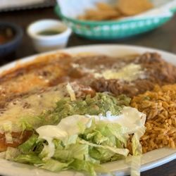 El Portal Taqueria - Enchilada and chile relleno combination plate with rice and beans.