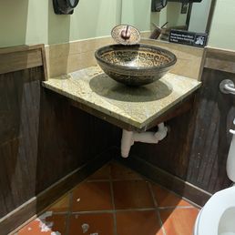 Sink didn't drain well. Paper towels didn't come out without having to turn the knob.