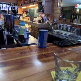 a glass of water on the bar