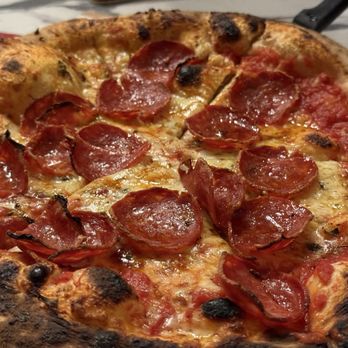 Roostica - HELLS KITCHEN DIAVOLA - San Marzano Tomatoes, mozzarella, oregano, garlic, SPICY salami and pecorino cheese - Italian Near Me - Key West, Florida
