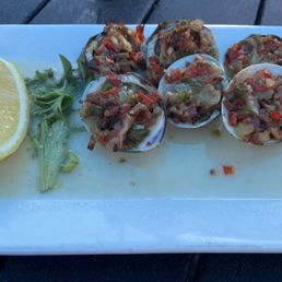 Clams casino appetizer. Skip, 18 bucks for a swallow.