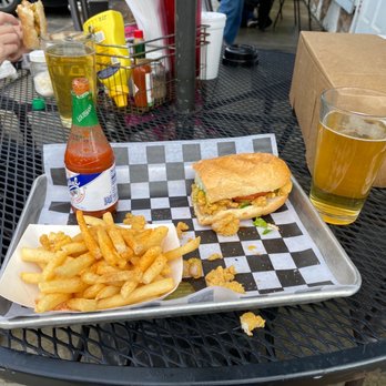 Dry Dock Cafe - a tray of fries and a sandwich - Bars Near Me - New Orleans, Louisiana Dry Dock Cafe - a tray of fries and a sandwich - Bars Near Me - New Orleans, Louisiana