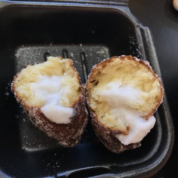 Da Coconut Cafe - Money shot of malasada filled with coconut pudding. - Poke Near Me - Temecula, California