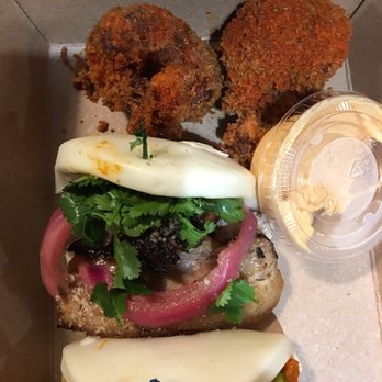 Suzy Siu's Baos - Kimchee fritters and dipping sauce at top, pork belly bao and KFC bao at bottom - Korean Near Me - Atlanta, Georgia Suzy Siu's Baos - Kimchee fritters and dipping sauce at top, pork belly bao and KFC bao at bottom - Korean Near Me - Atlanta, Georgia