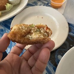 Ella's Mama Mia's Restaurant and Pizzeria - Fake crab cakes we pulled apart so you can see the inside