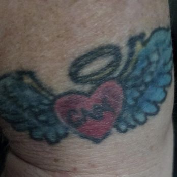 Harry's Tattoo - This is my angel wings for doing hospice work ,some of the black outline is missing and the letters all run together - Tattoo Near Me - Boyertown, Pennsylvania Harry's Tattoo - This is my angel wings for doing hospice work ,some of the black outline is missing and the letters all run together - Tattoo Near Me - Boyertown, Pennsylvania