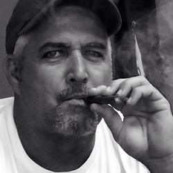 Vapor Planet - Shannon Ikner Vaping on an e- cigar.