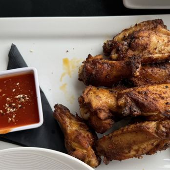 Black Cap Grille - Spice dry rub chicken wing appetizer - Burgers Near Me - North Conway, New Hampshire Black Cap Grille - Spice dry rub chicken wing appetizer - Burgers Near Me - North Conway, New Hampshire