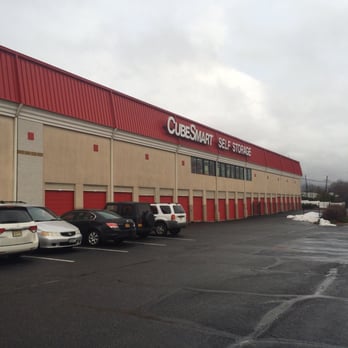 CubeSmart Self Storage - Front of CubeSmart - outside garages perfect to store cars! gated with high tech security cameras and passcode keypad entrance - Self Storage Near Me - Clifton, New Jersey