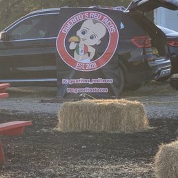 Gueritos red taco sign and Instagram and Facebook page