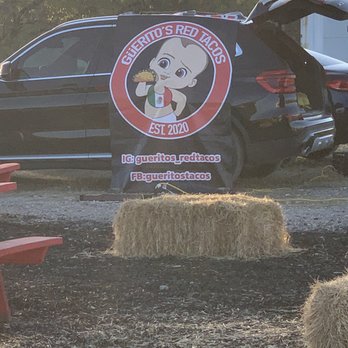 Guerito’s Red Tacos - Gueritos red taco sign and Instagram and Facebook page - Food Trucks Near Me - San Antonio, Texas