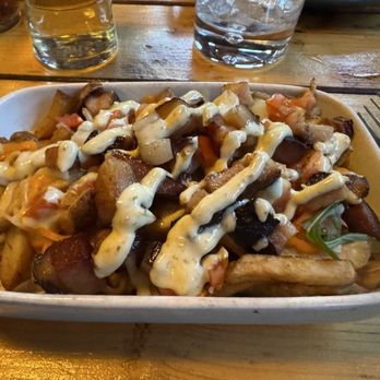 The Stubborn Goat Gastropub - The loaded fries. It was a tasty treat for sure. All the good groups here! - Gastropubs Near Me - Halifax, Nova Scotia The Stubborn Goat Gastropub - The loaded fries. It was a tasty treat for sure. All the good groups here! - Gastropubs Near Me - Halifax, Nova Scotia
