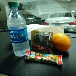 To-Go Breakfast: a bottle of water, muffin, orange and granola bar. Not worth the cost To-Go Breakfast: a bottle of water, muffin, orange and granola bar. Not worth the cost