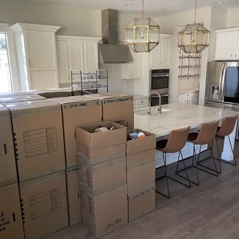 Creative Moving & Packing - Organized and labeled boxes in the new home - Movers Near Me - Phoenix, Arizona