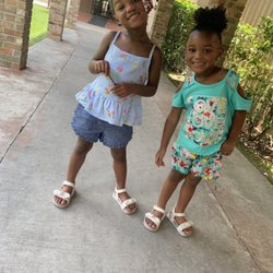 Stay and Play Day Care Center - My daughters at a young age in walk way of stay in play in the spring time