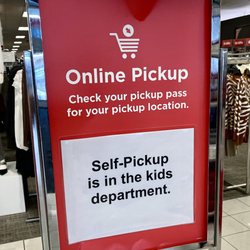Kohl's - Sign at main entrance says to go to the far back of store, stand in long line, get told my order is at front of store in customer service.