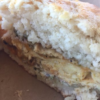 DV8 Kitchen - Inside of the huevos rancheros sandwich... you can choose from sourdough bread, southern biscuit or a bun. - Bakeries Near Me - Lexington, Kentucky