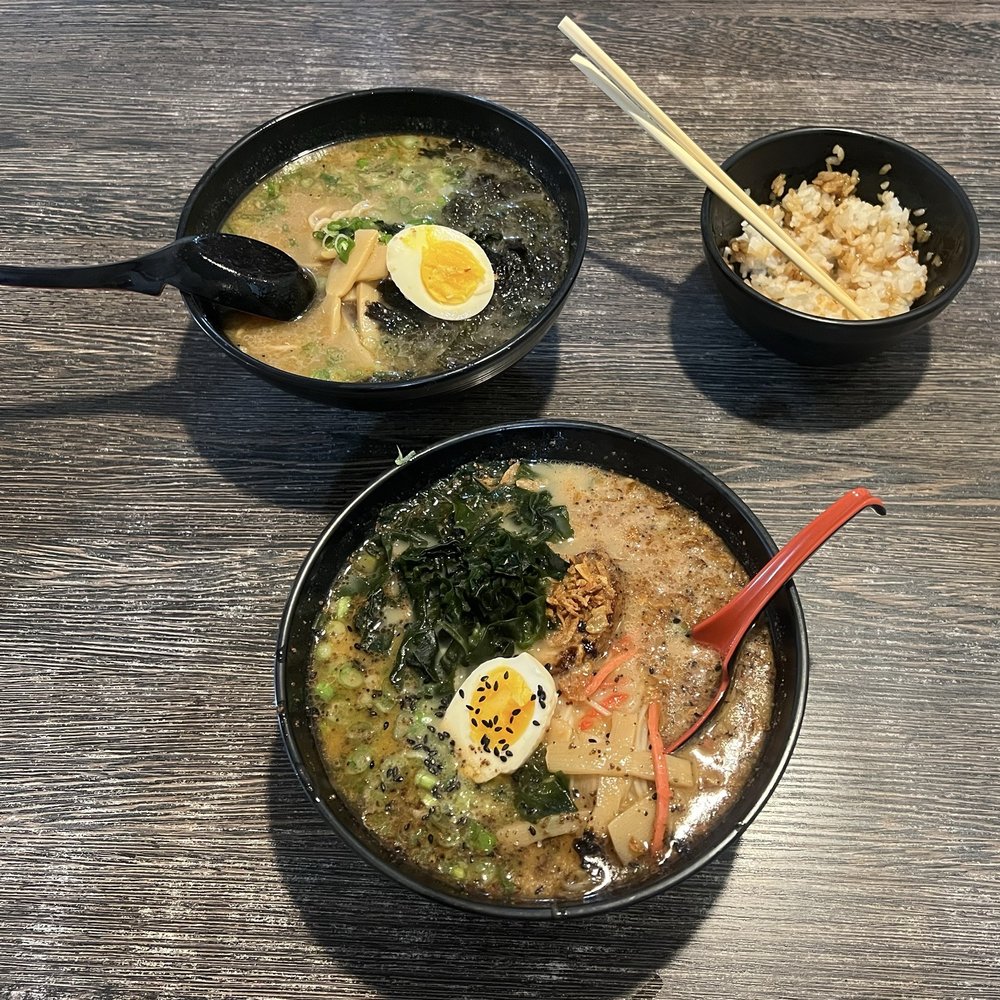 Raijin Ramen - Black Garlic Tonkotsu (red spoon) and Umami Shoyu (black spoon). The Unagi Don was in that little black bowl--so good! - Ramen Near Me - Tucson, Arizona Raijin Ramen - Black Garlic Tonkotsu (red spoon) and Umami Shoyu (black spoon). The Unagi Don was in that little black bowl--so good! - Ramen Near Me - Tucson, Arizona