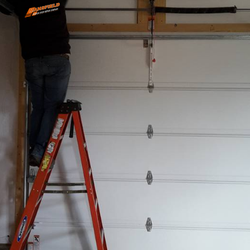 Mansfield Garage Door Repair - Garage Door Torsion Spring repair