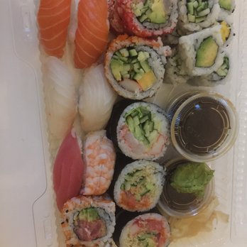 Ichi Sushi - a variety of sushi in a styrofoam container - Sushi Bars Near Me - Montreal, Quebec