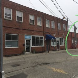 Aurora Wiselives Center For Well Being - Clinic door circled in green. Entrance in back.
