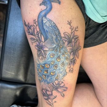 Prison Blues Tattoo Studio - Tattoo of peacock and flowers - Tattoo Near Me - Reno, Nevada