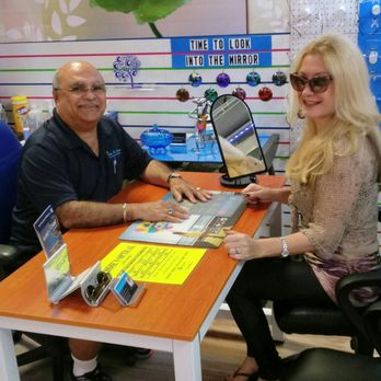 Eddie's Optical - Here I am dispensing a pair of sunglasses. Michele is my neighbor at the Festival Mall. JMC Hairwear. - Eyewear & Opticians Near Me - Pompano Beach, Florida Eddie's Optical - Here I am dispensing a pair of sunglasses. Michele is my neighbor at the Festival Mall. JMC Hairwear. - Eyewear & Opticians Near Me - Pompano Beach, Florida