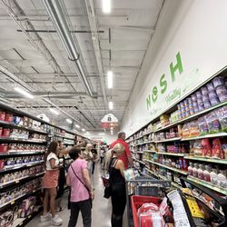 Grocery Outlet - Check out line on outskirts of store.
