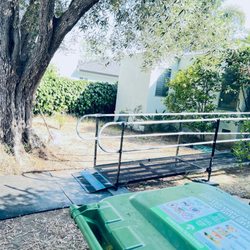 Amramp - Instead of a ramp cutting the yard in half, used mats for accessibility and it was economical.
