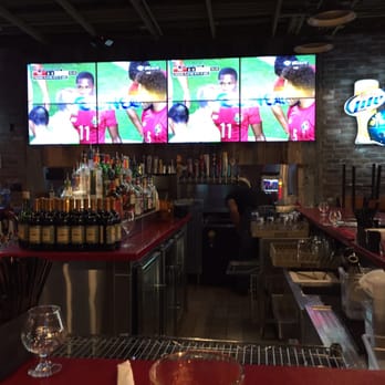 Native Grill & Wings - Bar area where the 8 screens link up. Not much of a liquor selection... - Chicken Wings Near Me - Tucson, Arizona