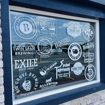 Spinal Taproom - a window with stickers on it - Beer Bar Near Me - Cedar Rapids, Iowa Spinal Taproom - a window with stickers on it - Beer Bar Near Me - Cedar Rapids, Iowa