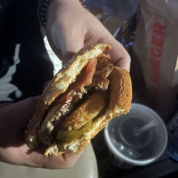 Carl's Jr - Hair in burger right in front of the onion ring - Burgers Near Me - Ardmore, Oklahoma