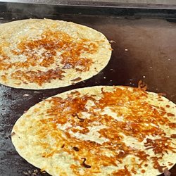 Abel and Abel Tacos - First Step: melt that cheese for them burritos!