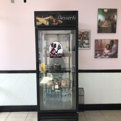 Case of specialty chocolates and huge cake jars