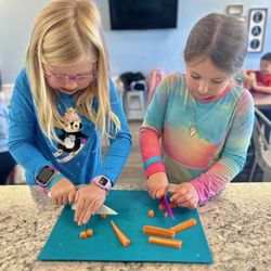 Flour Power Cooking Studios Frisco - "cutting up" at cooking camp!