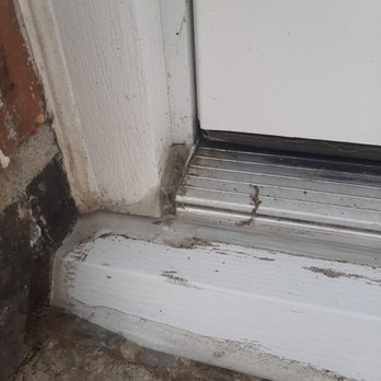 Power Home Remodeling - This clear caulk is a patch job to prevent leaking for a poorly installed door. - Windows Installation Near Me - Centennial, Colorado Power Home Remodeling - This clear caulk is a patch job to prevent leaking for a poorly installed door. - Windows Installation Near Me - Centennial, Colorado