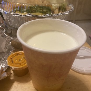 Super Taco Deli & Restaurant - a plastic cup of milk - Mexican Near Me - Brooklyn, New York Super Taco Deli & Restaurant - a plastic cup of milk - Mexican Near Me - Brooklyn, New York