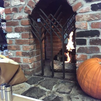Celadon - Fireplace next to our table on outside patio - Seafood Near Me - Napa, California